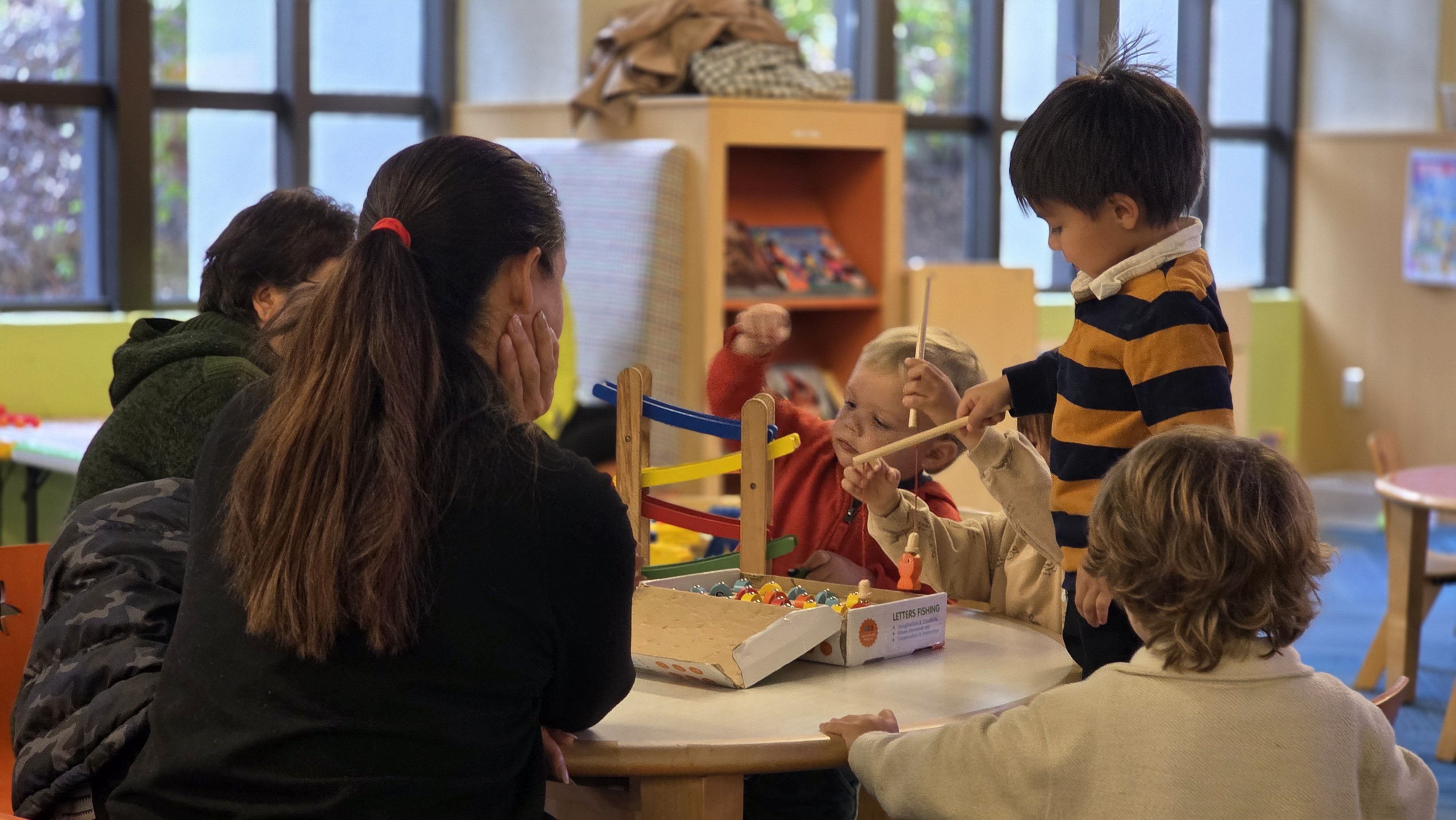 Kids playing with toys in library