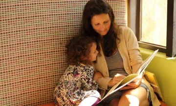Mom and daughter reading