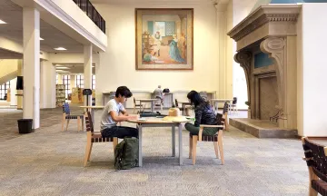 people studying at library