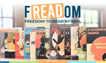 a sample of banned books titles on a shelf with "freedom to read" logo
