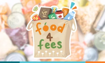 Grocery bag filled with food with the text "Food 4 Fees" on its side