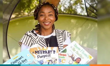 Portrait photo of Fleurie Leclercq posing with books.