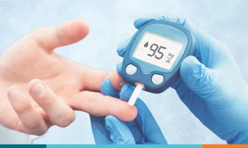 outstretched hand and finger-test diabetes reader performing diabetes test