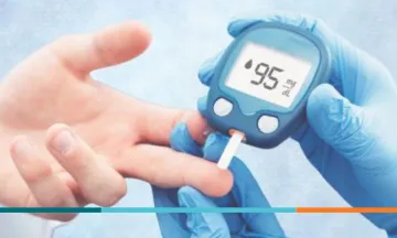 outstretched hand and finger-test diabetes reader performing diabetes test