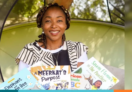 Portrait photo of Fleurie Leclercq posing with books.