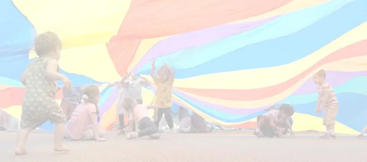 Kids playing with parachute