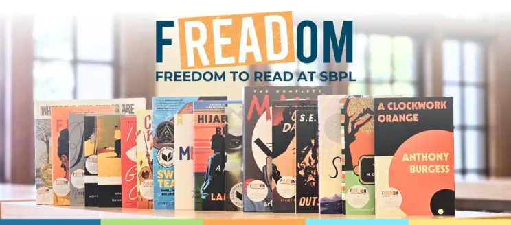 a sample of banned books titles on a shelf with "freedom to read" logo