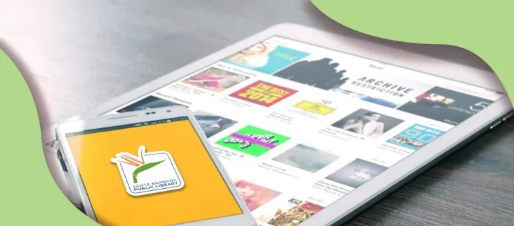 tablet with phone laying on top