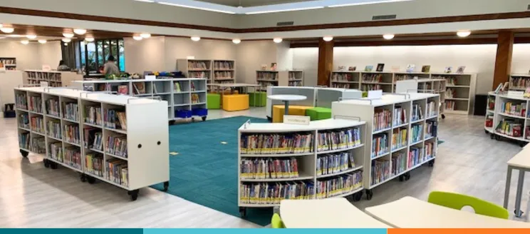 Library interior filled bookshelves