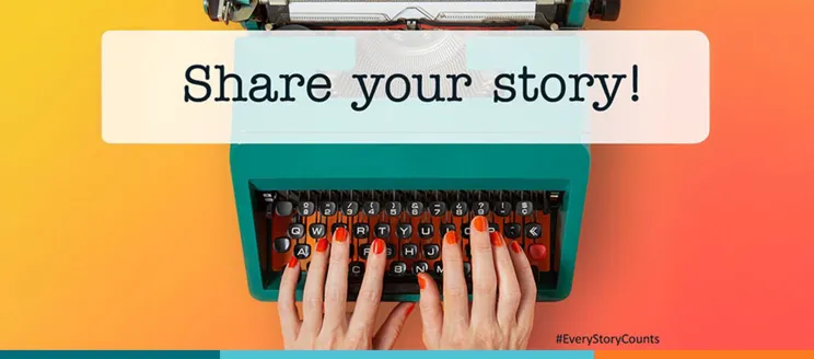 Hands typing on a typewriter