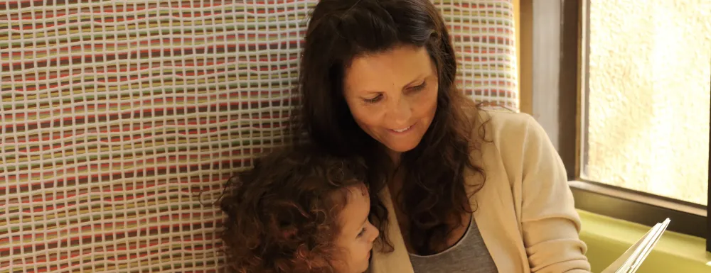 Mom and daughter reading